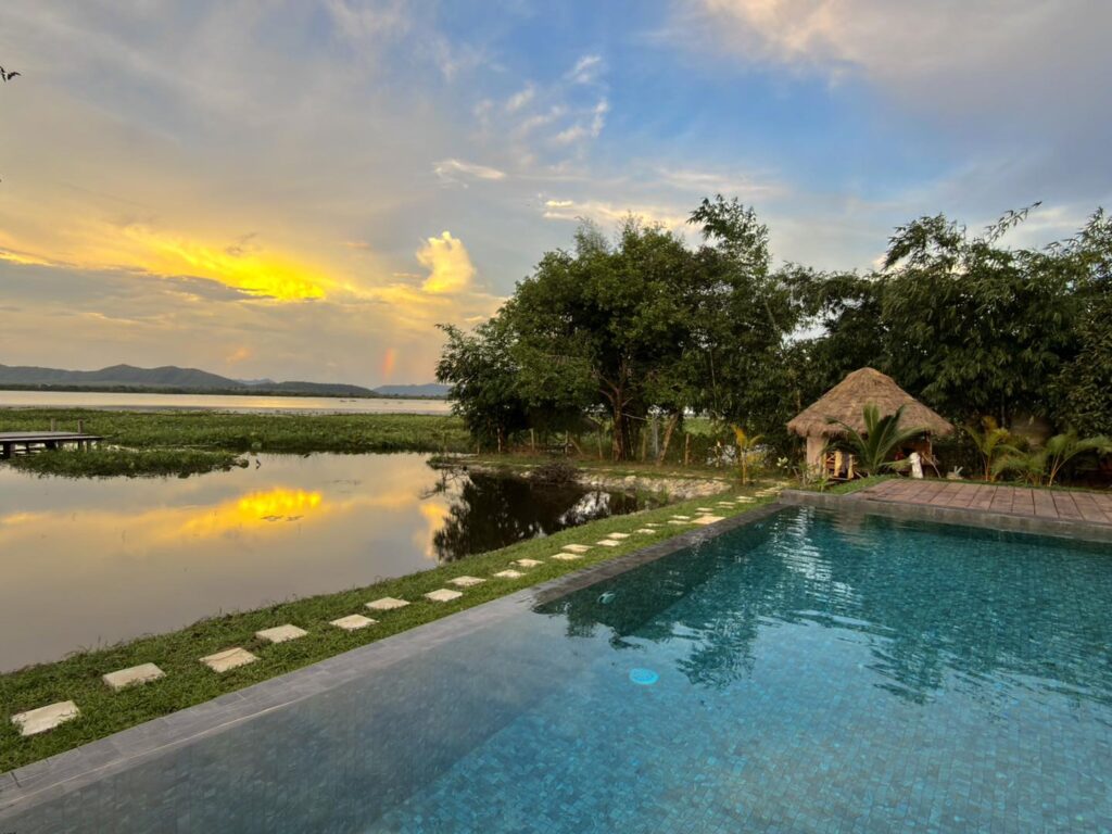 Family-friendly swimming pool with 360 degree lake view